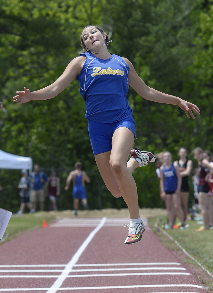 Kate Hall competes in the long jump during the Class B Track State Championship in Bath on June 6.