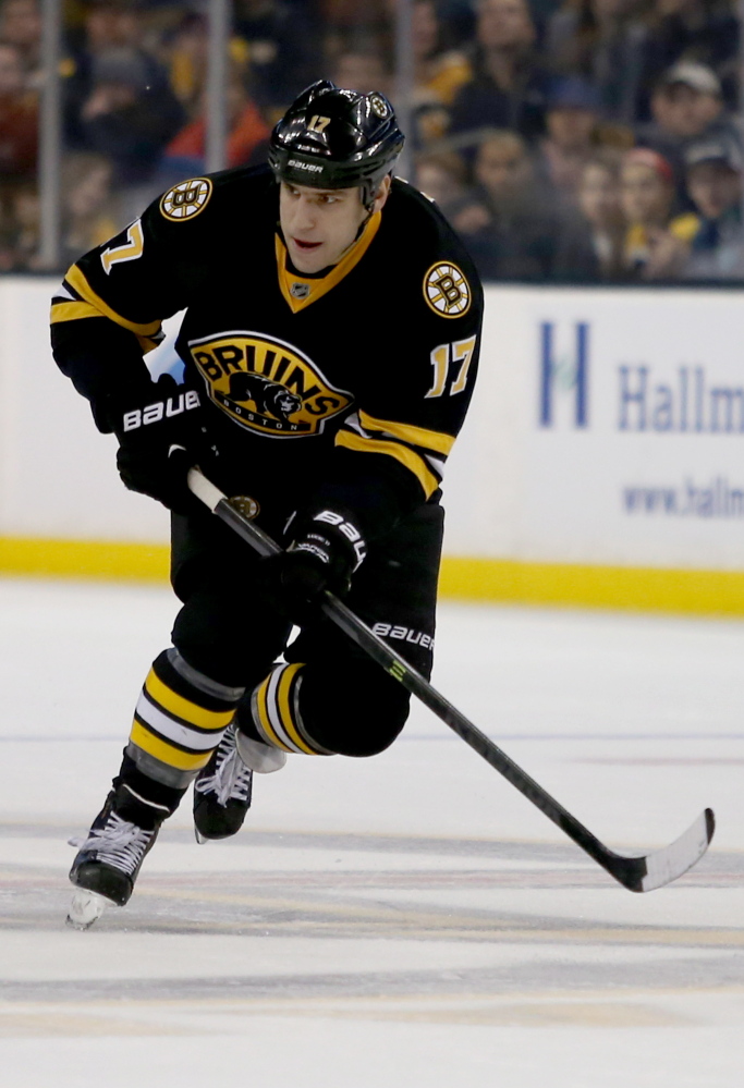 Milan Lucic was traded Friday to the Los Angeles Kings, ending his eight-year tenure with the Boston Bruins.