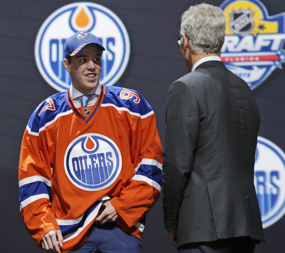 Connor McDavid, who enters the NHL with a ton of expectations, was the first choice in the draft Friday night, by the Edmonton Oilers, who are hoping to recapture the glory of the Wayne Gretzky Stanley Cup seasons.