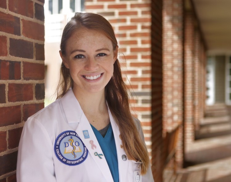 A second-year student at the University of New England College of Osteopathic Medicine in Biddeford, Kristina Michaud believes her degree will afford her the opportunities to pay back her sizable debt.