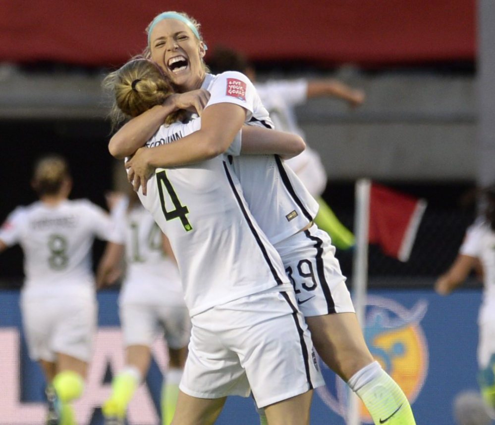 Julie Johnston, left, and Becky Sauerbrunn, celebrating a goal against China in the quarterfinals, are part of a confident United States team preparing for a semifinal showdown Tuesday against Germany as the world’s top two ranked teams will meet.