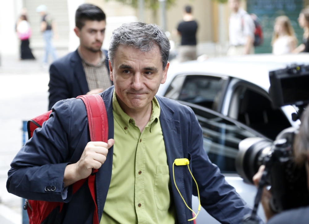 Greece’s Deputy Foreign Minister for international economic relations, Euclid Tsakalotos, arrives at the Finance Ministry in Athens, on Sunday.