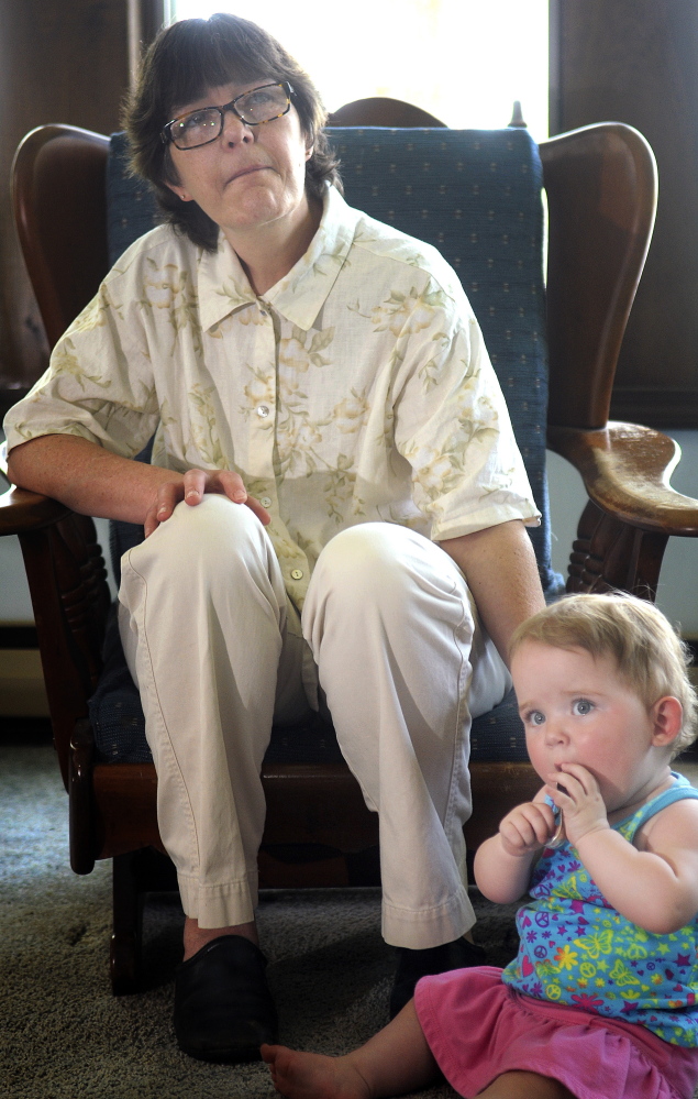 Donna Lufkin, of Gardiner, with Cheyenne, whom she has guardianship over, attends a meeting in Belgrade of the Augusta Area Kinship Support group for grandparents raising their grandchildren.