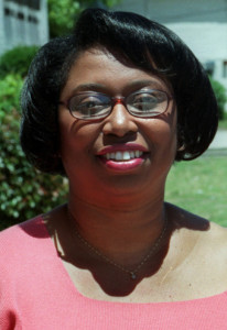 In this photo taken in 2003, Cynthia Hurd, a head librarian with the Charleston County Library's John L. Dart Branch, poses for a picture in Charleston, S.C. Hurd was among the victims of a young white man who sat in a prayer group at The Emanuel African Methodist Episcopal Church. Adam Ferrell /The Post And Courier via AP