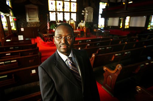The Rev. Clementa Pinckney stands in the sanctuary of Emanuel AME Church in Charleston, S.C., in this Nov. 22, 2010, photo. Grace Beahm/The Post and Courier via AP