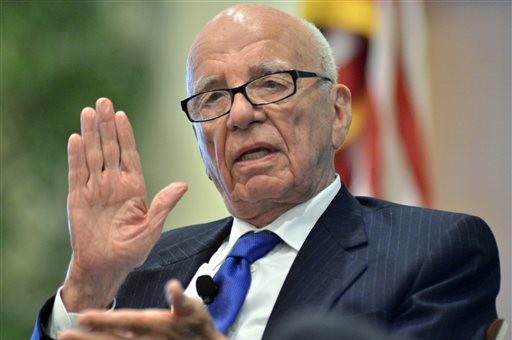 Rupert Murdoch speaks during a forum on The Economics and Politics of Immigration, in Boston, in this 2012 photo. Murdoch, 84, started his global media conglomerate with a single newspaper in his native Australia.