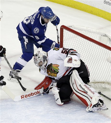 Tampa Bay Lightning center Tyler Johnson scores past Chicago Blackhawks goalie Corey Crawford during the second period in Game 2 of the NHL hockey Stanley Cup Final on Saturday in Tampa. This Stanley Cup series fin which neither team has enjoyed a two-goal lead through the first five games.The Associated Press