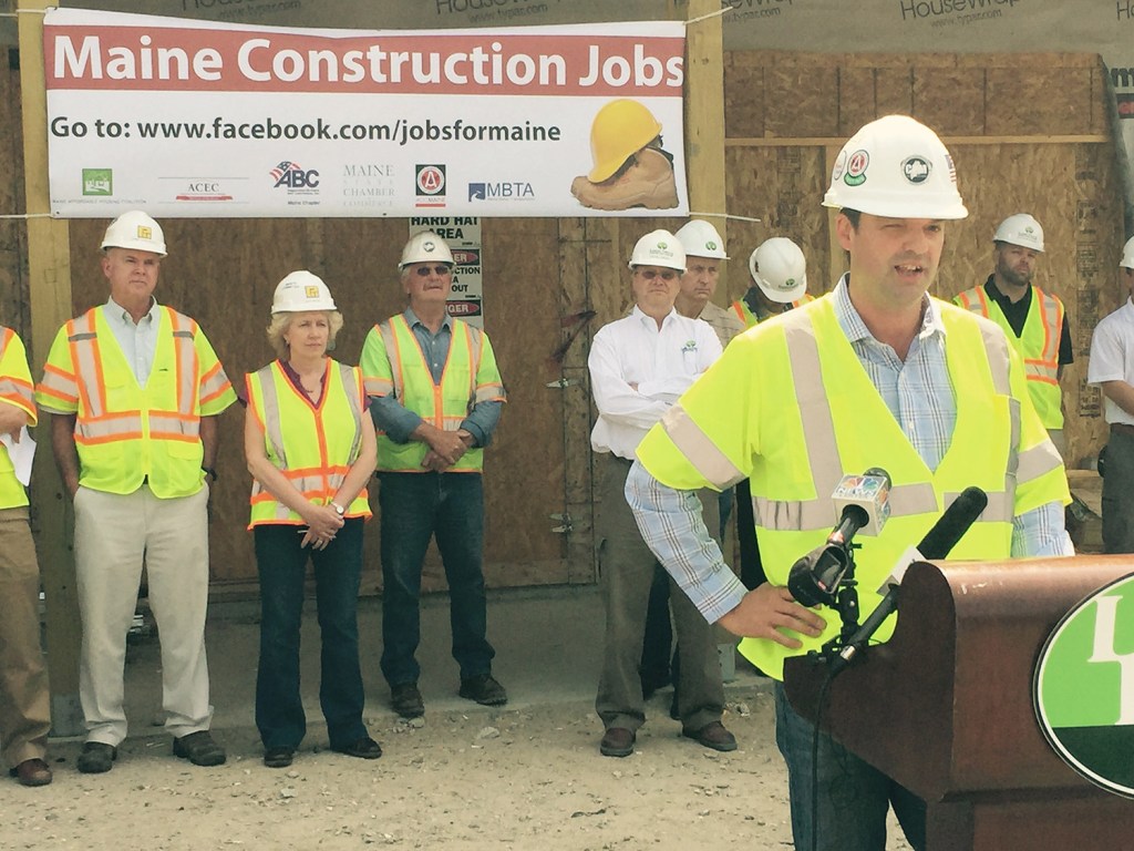 Timothy Ouellette, chief financial officer of Freeport-based CPM Constructors, speaks at a news conference in South Portland to advocate for letting voters decide bond questions on funding infrastructure and housing projects.