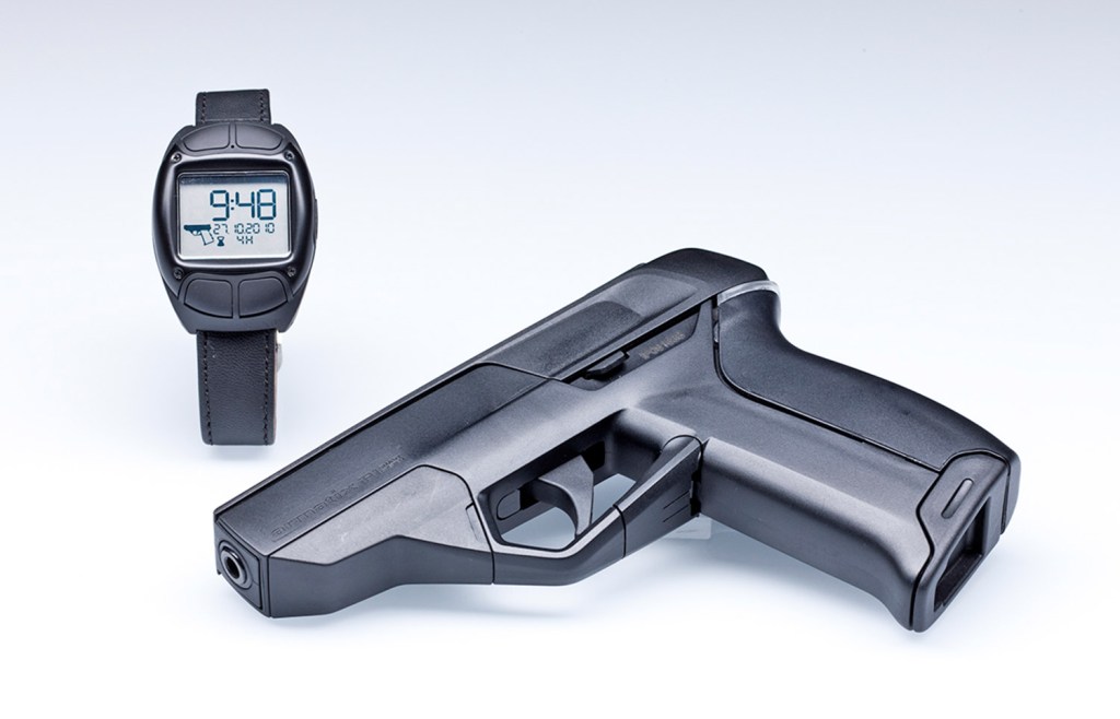 An Armatix iP1 .22-calibre pistol smart gun pistol and iW1 Radio-frequency identification active wrist watch.