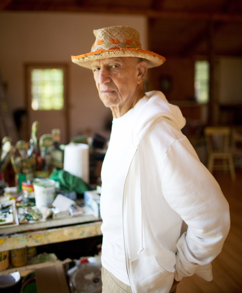 Alex Katz works in the studio next to his summer home in Lincolnville.