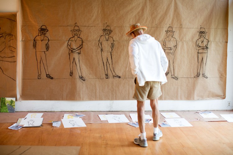 Alex Katz studies sketches of his daughter-in-law, Vivien, in his studio in Lincolnville."I'm working more now than I ever did in my life, and I can't think of anything more interesting to do than come home and work on this thing, which I don't know what it will end up doing."