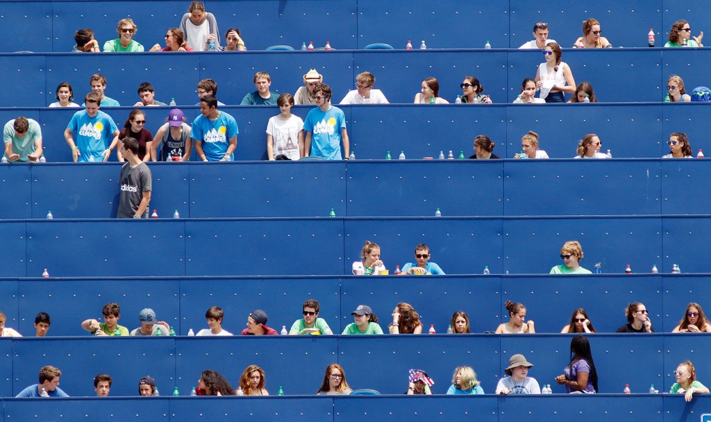 From the seats above the right field fence, Sea Dogs fans watch a midday home game against the Binghamton Mets on Monday. Attendance at home games for the Sea Dogs is up for the second straight year.
Gregory Rec/Staff Photographer