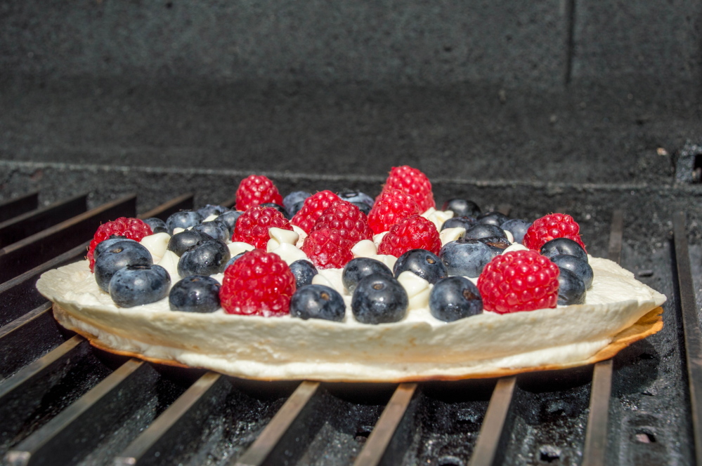 Ricotta cheese paired with blueberries and raspberries gives these grilled dessert quesadillas patriotic appeal. 