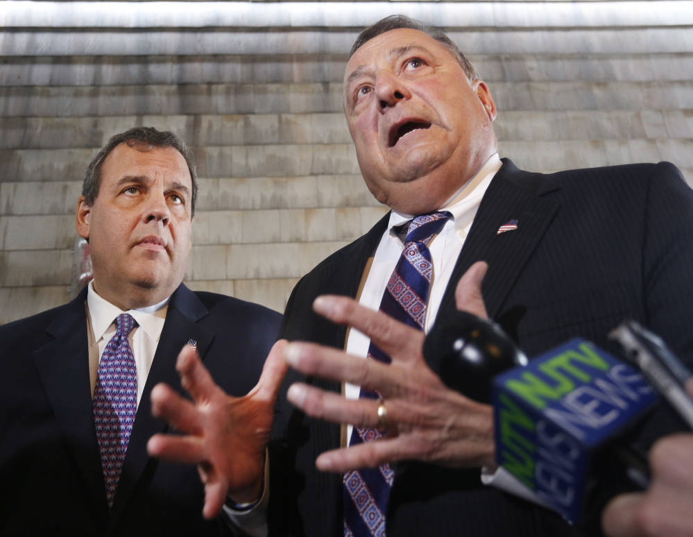 Maine Gov. Paul LePage accompanies N.J.. Gov. Chris Christie during a visit to Becky’s Diner in Portland in July.