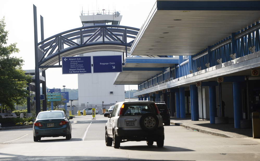 Cars arrive Thursday at the Portland International Jetport, which was getting busier as the holiday approached. The jetport ended its 2015 fiscal year with a total passenger count of about 1.7 million, roughly the same as in fiscal 2014.