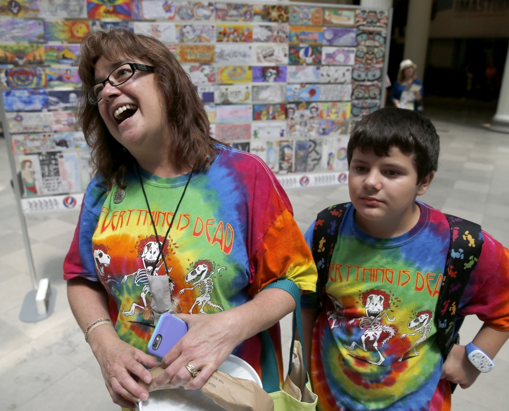 Rebecca Ostrega and her son Jake visit an exhibit dedicated to the band at the Field Museum in Chicago.
Associated Press photos