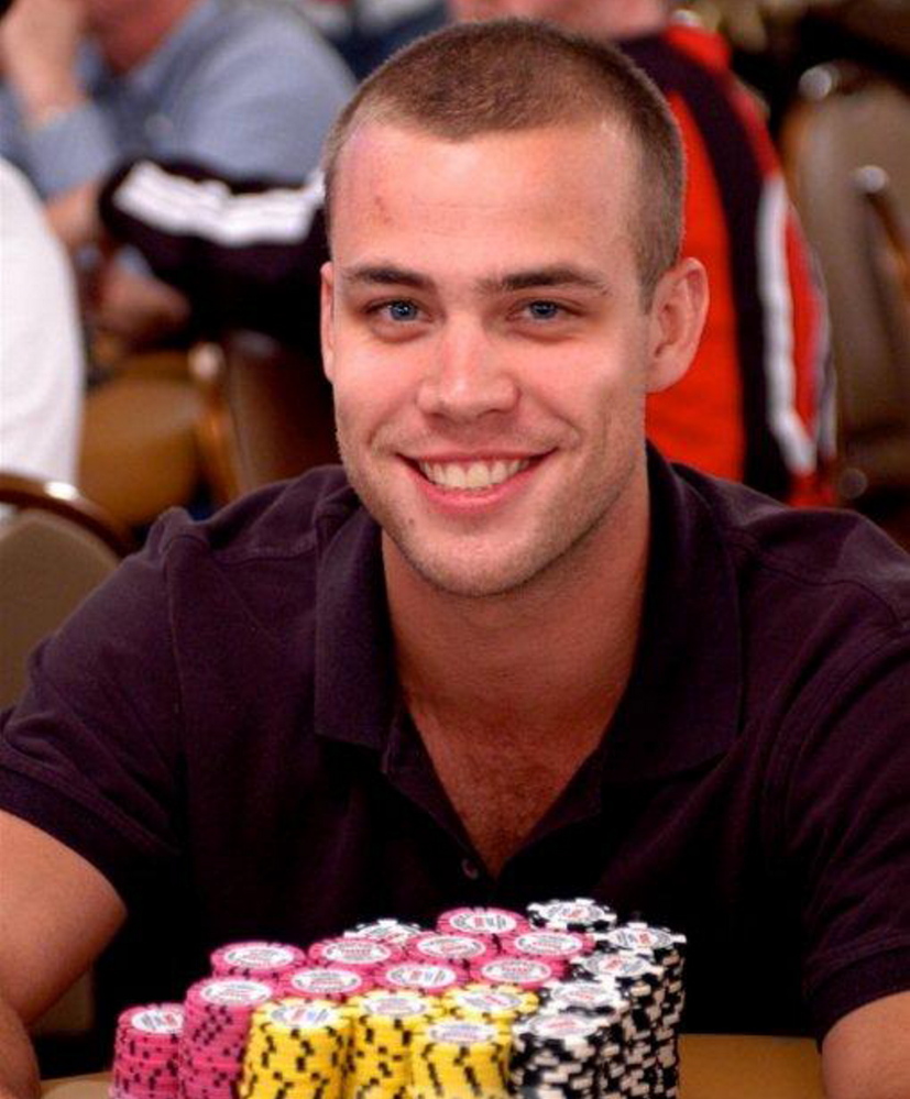 Matt Woodward with lots of chips in front of him at the poker table where you can say lots of nice stuff about him jher ;okn ;kjn; kjn; kjn; kl
