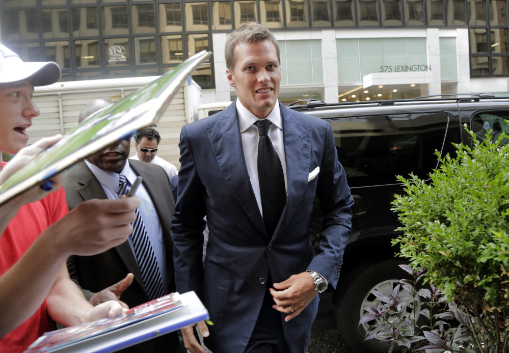 Tom Brady arrives for his appeal hearing at NFL headquarters in New York on June 23. The NFL Players Association released the 457-page transcript of his testimony Tuesday. In it, Brady denies tampering with footballs in the AFC championship game.
The Associated Press