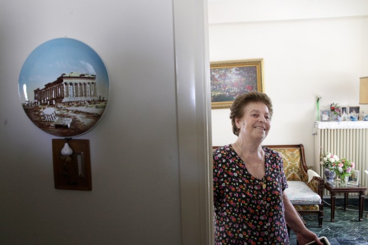 Roza Alverti, 83, has had to stop paying utility bills in the one-bedroom Athens apartment that she shares with two unemployed adult grandchildren. “Food doesn’t grow on the streets in Athens,” she says.