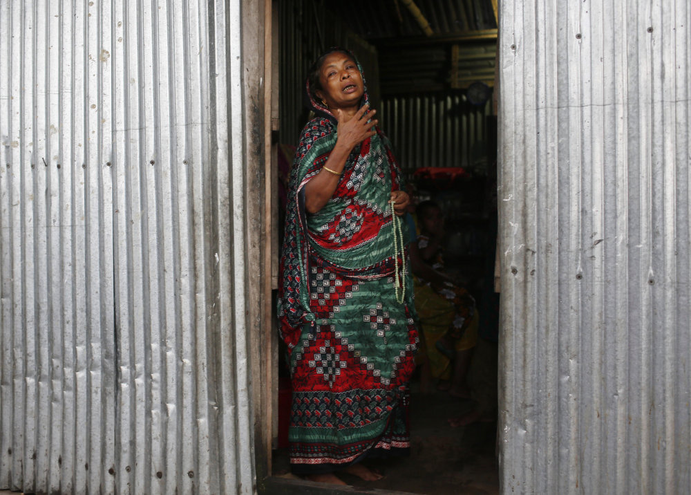 Musammat Khudaja, grandmother of Rubi Akhtar, 12, who died in a stampede, cries at her home in the town of Mymensingh, 70 miles north of Dhaka, Bangladesh on Friday. 