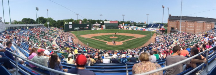 Fans enjoy a game between the Portland Sea Dogs and Binghamton Mets on Monday at Hadlock Field. For the second straight season, attendance at Sea Dogs’ games is on the rise. Through Monday’s game, the Sea Dogs have averaged 4,976 fans per game at Hadlock Field.