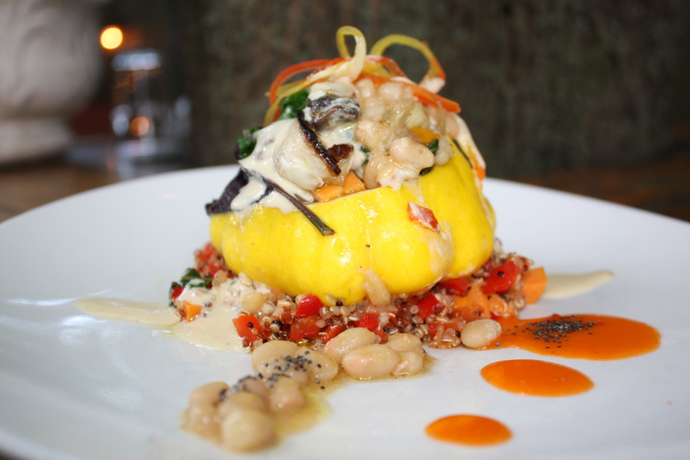 A recent off-menu vegan dish at Caiola’s in Portland featured baby pattypan squash stuffed with charred vegetables on a bed of sweet red pepper quinoa and topped with a cream sauce made from white beans, almond milk and cashews.