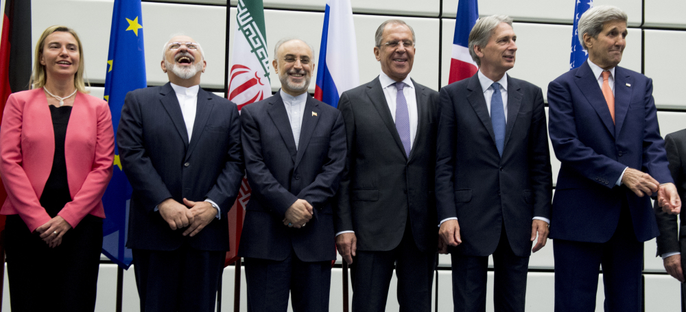 From left to right: European Union High Representative Federica Mogherini, Iranian Foreign Minister Mohammad Javad Zarif, head of the Iranian Atomic Energy Organization Ali Akbar Salehi, Russian Foreign Minister Sergey Lavrov, British Foreign Secretary Philip Hammond and U.S. Secretary of State John Kerry pose at the United Nations building in Vienna, Austria, on Tuesday. The Associated Press