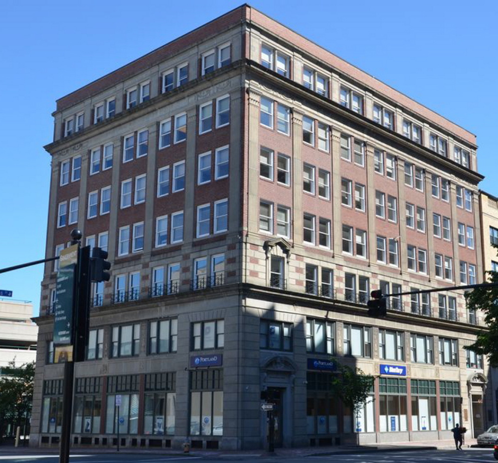The Clapp Memorial Building at the corner of Congress and Elm streets would house 30 market-rate units. A city development official calls it a ‘perfect fit in a perfect location.’