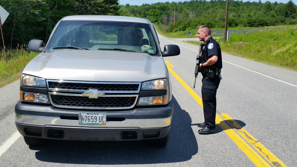 Lincoln Officer Josh McKechnie stops a truck headed into Lee at the Lincoln-Lee town line.