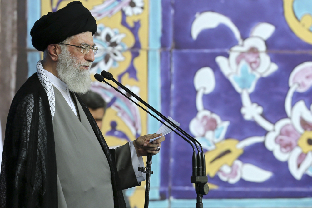 Iranian Supreme Leader Ayatollah Ali Khamenei delivers his sermon during the Eid al-Fitr prayer at the Imam Khomeini Grand Mosque in Tehran, Iran on Saturday. Khamenei said a historic nuclear deal with world powers reached this week won’t change Iran’s policy toward the “arrogant” government of the United States.