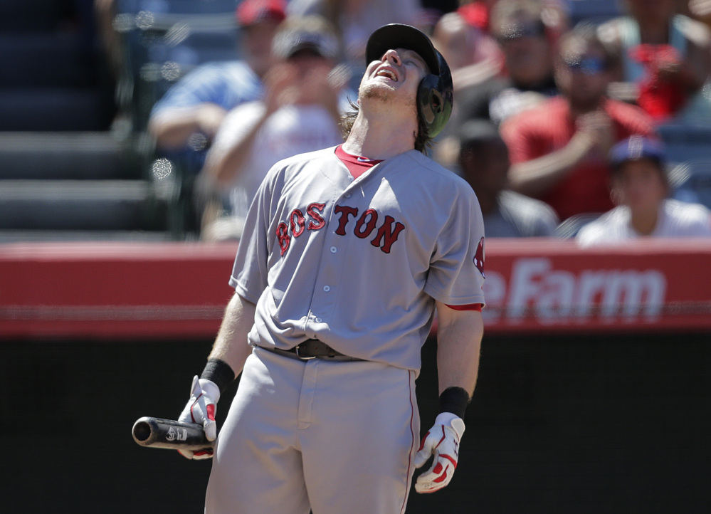 Boston’s Ryan Hanigan reacts after striking out in the fourth inning of the Red Sox 11-1 loss to the Angels on Monday in Anaheim, Calif.