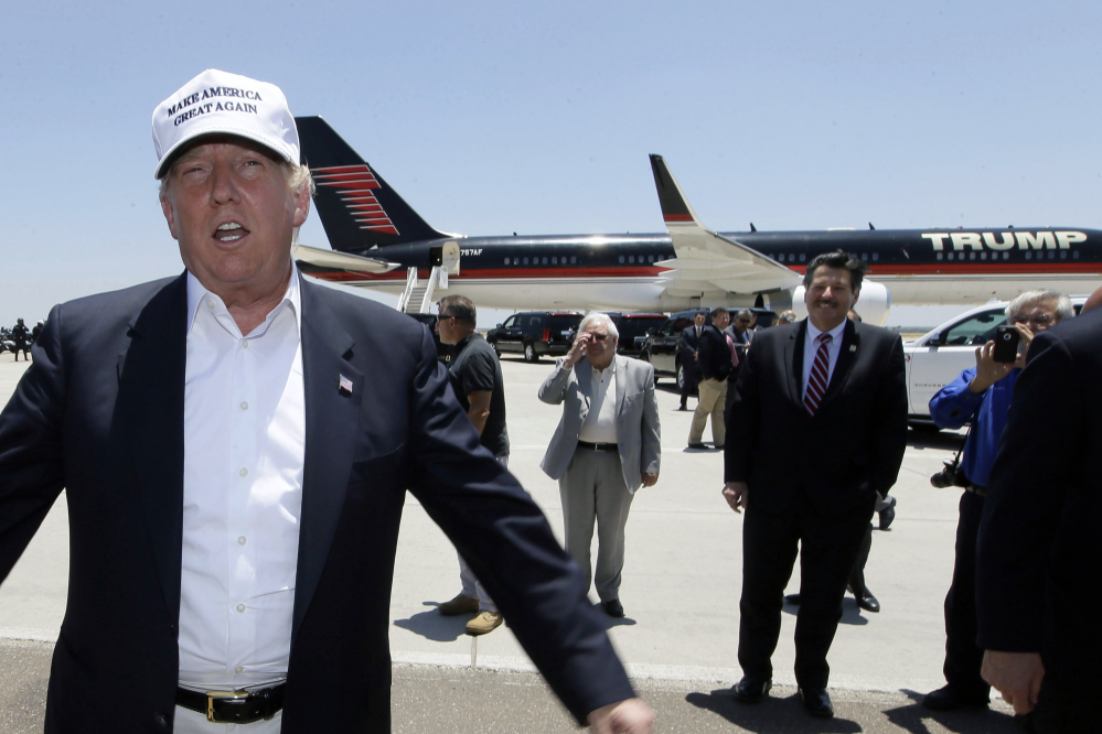 Republican presidential hopeful Donald Trump speaks after arriving at the airport for a visit to the U.S. Mexico border in Laredo, Texas, on Thursday.