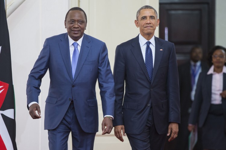 President Barack Obama, right, arrives with Kenyan President Uhuru Kenyatta for a bilateral meeting at State House, on Saturday, in Nairobi, Kenya.
