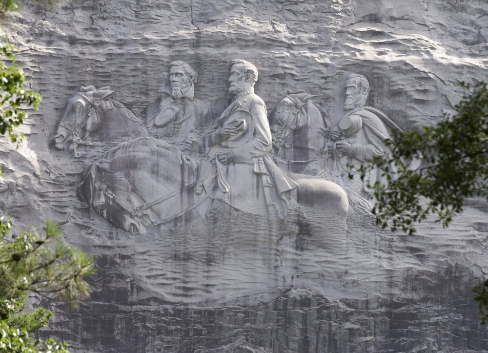 With Confederate symbols coming down throughout the South, the famous depiction of three Civil War figures on a Georgia mountain has some calling for its removal.