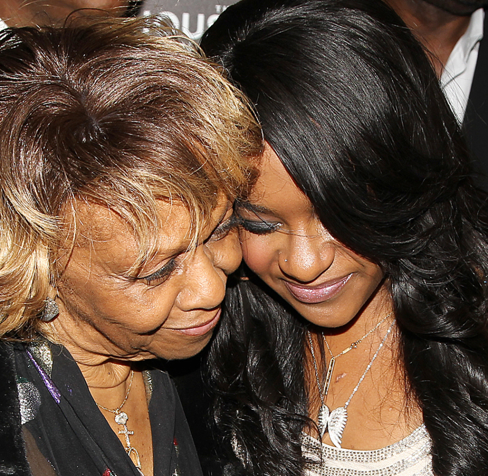 Cissy Houston stands next to granddaughter Bobbi Kristina Brown, who died at 22 Sunday after being placed in hospice care.