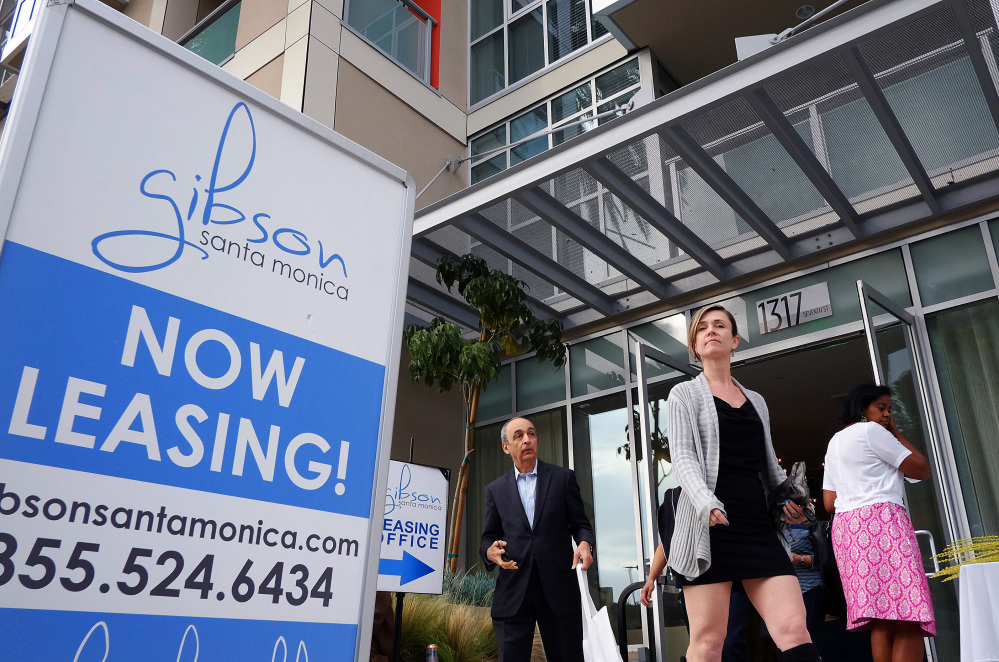 Visitors arrive for the grand opening of Gibson Santa Monica, a new luxury apartment complex in downtown Santa Monica, Calif. Residential rents, the biggest driver of inflation in 2015, climbed 3.5 percent in June from a year earlier.