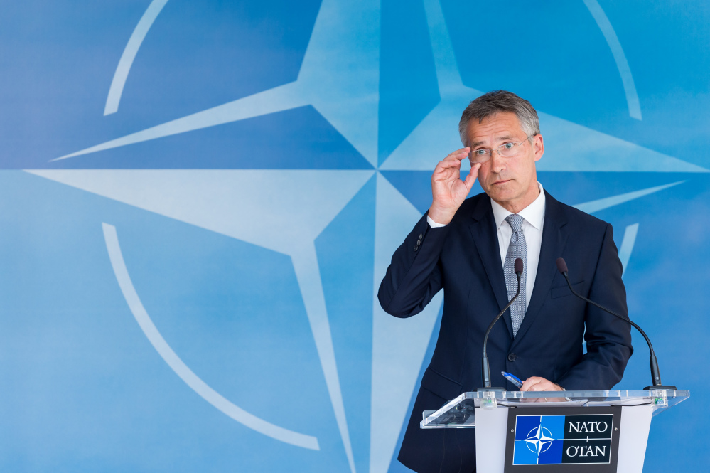 NATO Secretary General Jens Stoltenberg addresses the media after a North Atlantic Council Meeting at NATO headquarters in Brussels on Tuesday. 
The Associated Press