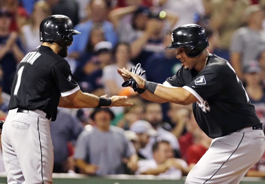 Chicago’s Jose Abreu, right, is congratulated by teammate Adam Eaton after his two-run home run off Red Sox starter Wade Miley on July 28, 2015.