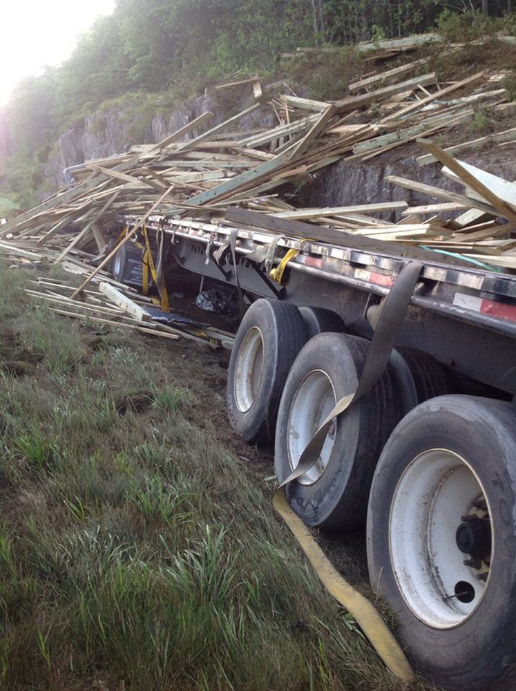 Lumber was spilled along the side of Interstate 95 northbound early Wednesday morning after a tractor-trailer crash.