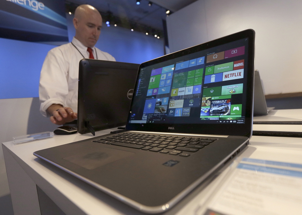 The new Windows 10 operating system debuted Wednesday as Microsoft tries to carve out a new role in a world that increasingly relies on smartphones, tablets and data stored online.