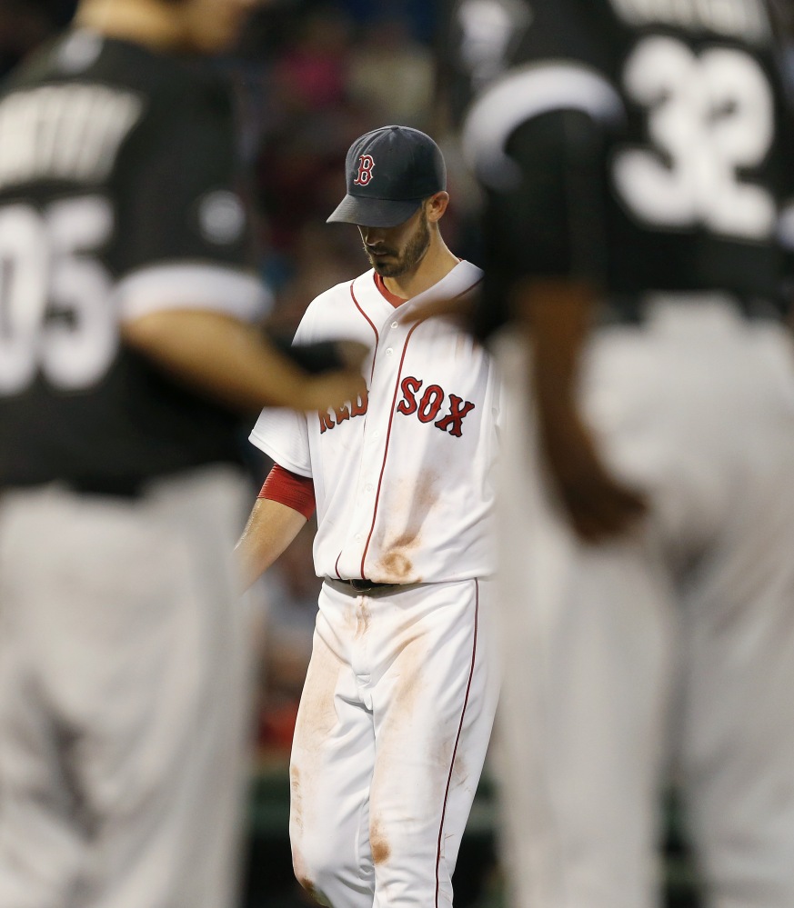 Red Sox starter Rick Porcello leaves the field after being taken out in the third inning of another ineffective start.