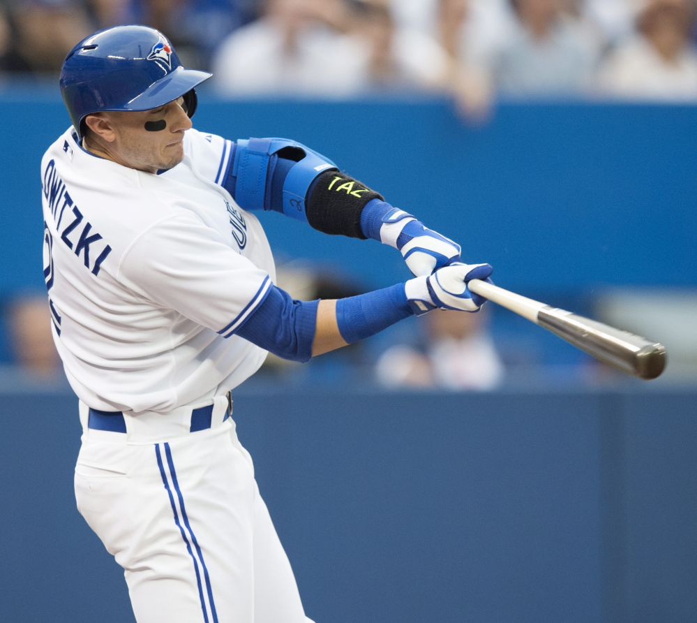 Troy Tulowitzki smacks a two-run home run in his first game with the Blue Jays on Wednesday. Tulowitzki had three hits in the Jays’ 8-2 win over the Phils.