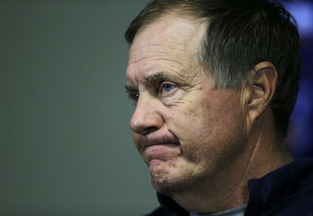 New England Patriots head coach Bill Belichick listens to a question as he meets with the media before the team’s first practice at an NFL football training camp Thursday, July 30, 2015, in Foxborough, Mass. Belichick is stonewalling questions about deflated footballs for the second straight day. Belichick said before the team’s first practice of training camp on Thursday that he’s only worried about the day’s practice.