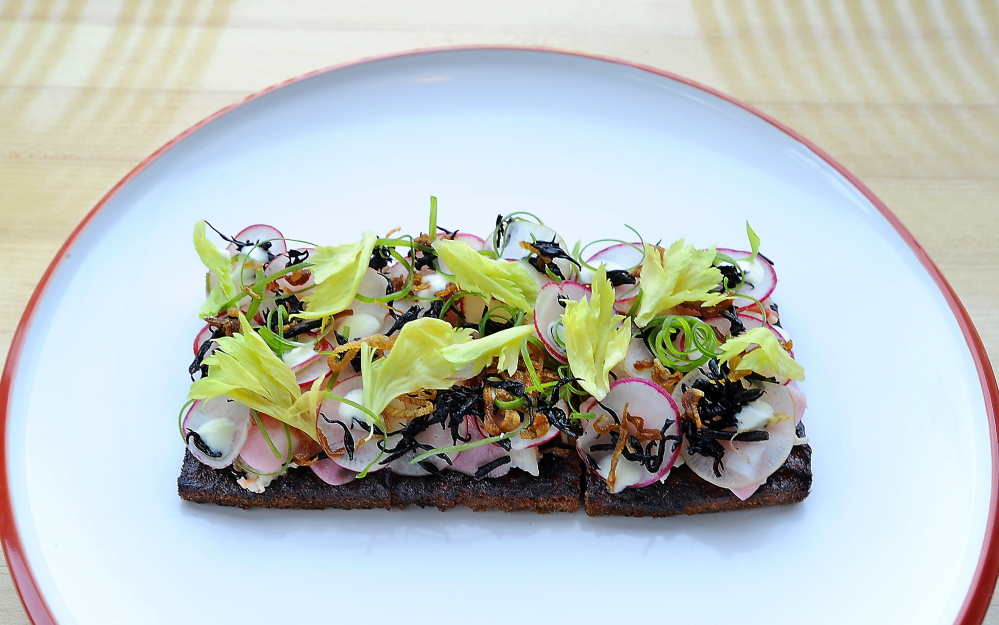 The Honey Paw’s lobster tartine with chilled lobster salad, lobster mousse, lemon emulsion, radish and hijiki.