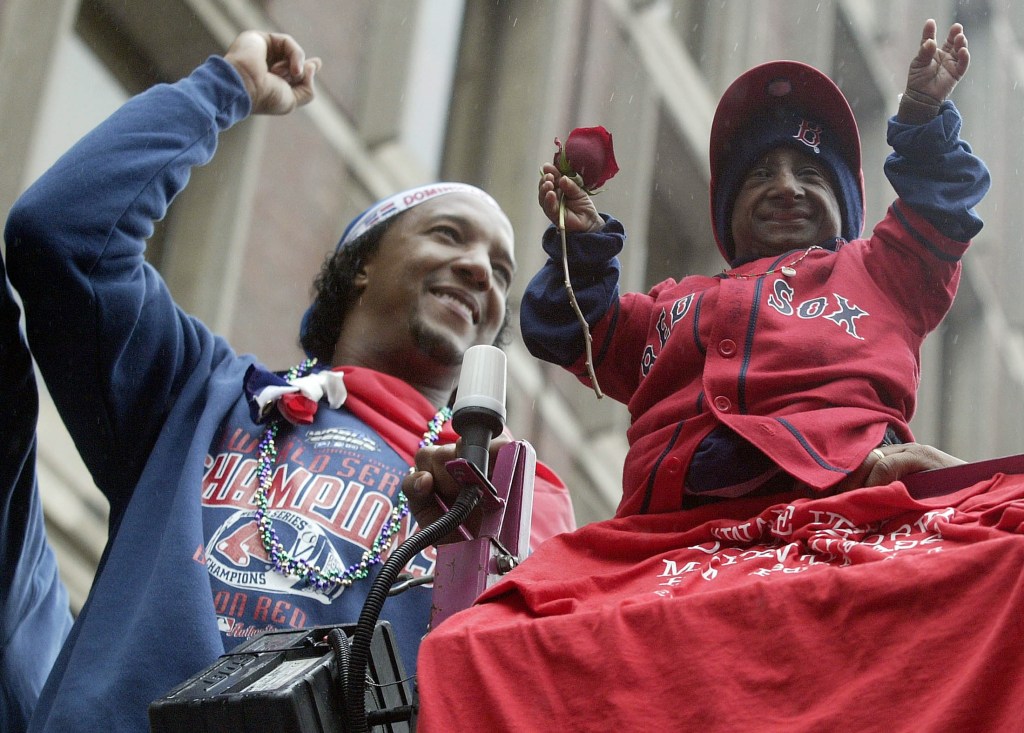 Yes, it was a parade to honor the 2004 World Series champion, and Pedro Martinez took a place of honor along with friend Nelson de la Rosa. Reuters/Jessica Rinaldi 