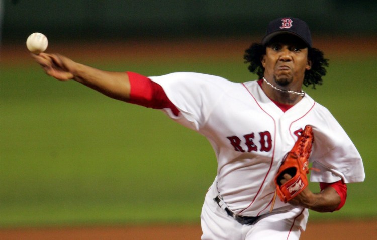 Listed at just 5 feet, 11 inches tall and 170 pounds, Pedro Martinez still managed to be a dominant pitcher during the steroid era. He had a record of 117-37 with the Red Sox. Paul J. Bereswill/Newsday