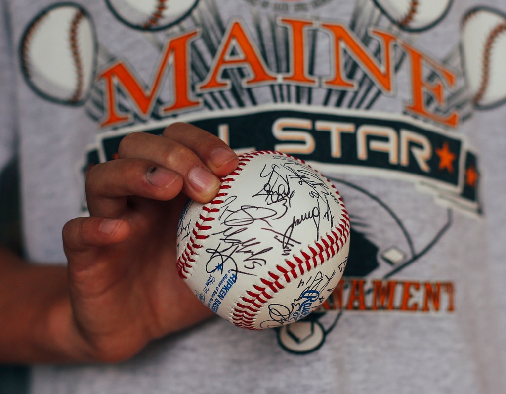 Caleb Phillips, 10, of Lisbon holds his autographed ball, signed by players in the Eastern League All-Star Game.
Whitney Hayward/Staff Photographer
