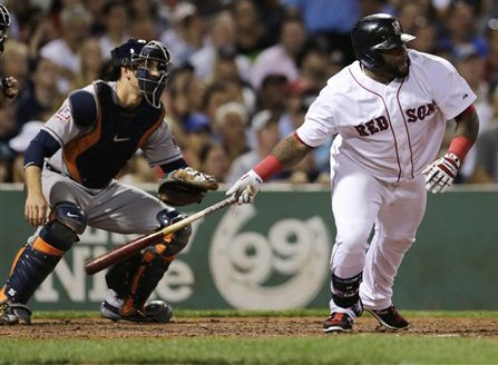 Boston's Pablo Sandoval heads down the first base line on an RBI single in the fifth inning against the Houston Astros at Fenway Park on Friday. The Associated Press