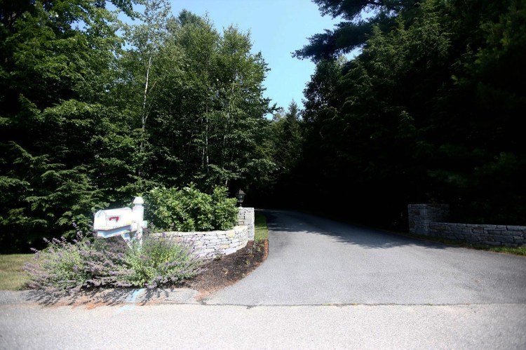 The driveway of 10 Tiger Lily Lane, the home of John Knight, who apparently fell off the second-floor balcony of his Cape Elizabeth home Saturday afternoon. Whitney Hayward/Staff Photographer