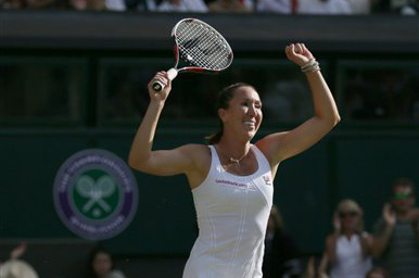 Jelena Jankovic of Serbia celebrates defeating Petra Kvitova of the Czech Republic in their singles match at the All England Lawn Tennis Championships in Wimbledon, London, on Saturday. The Associated Press